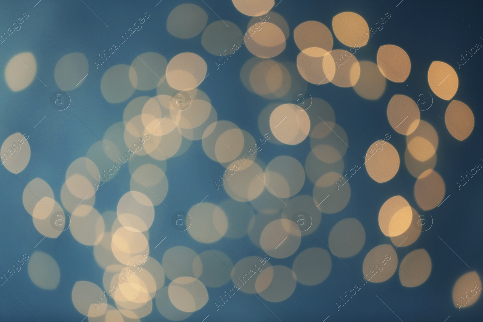 Photo of Blurred lights on color background. Beautiful bokeh effect