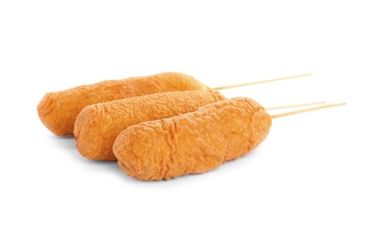 Photo of Delicious deep fried corn dogs isolated on white