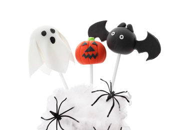 Photo of Delicious Halloween themed cake pops on white background