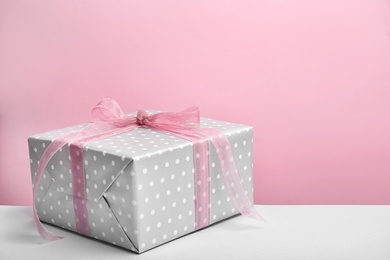 Photo of Elegant gift box for Mother's Day on table