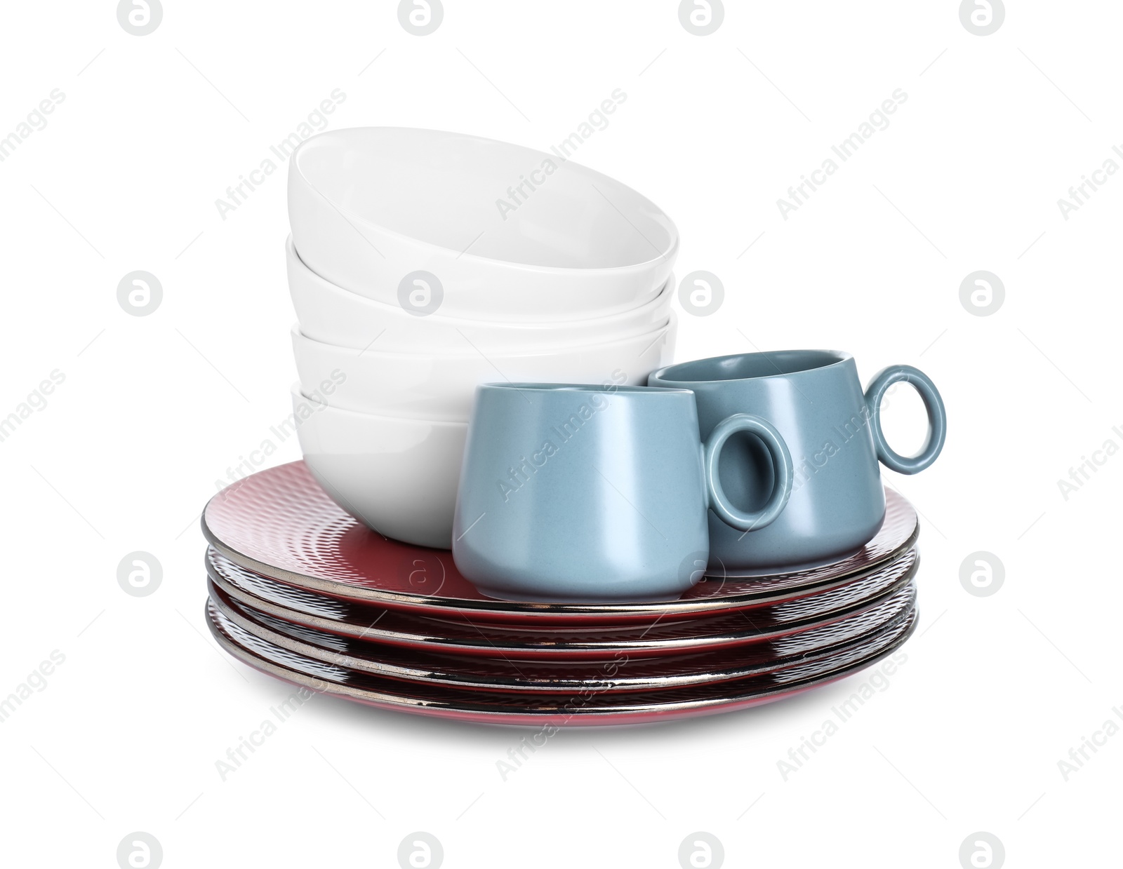 Photo of Beautiful ceramic plates, bowls and cups isolated on white