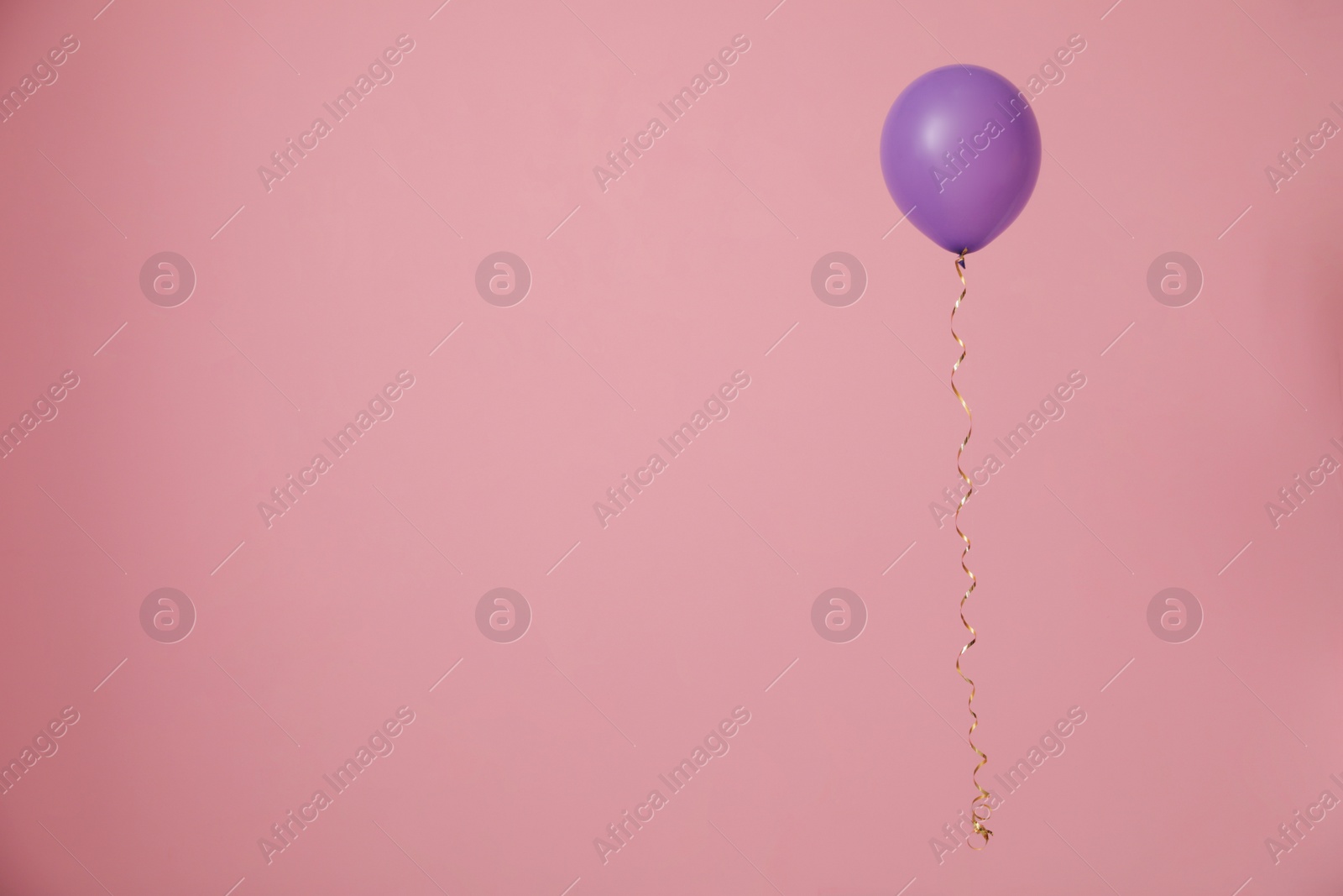 Photo of Bright balloon on color background, space for text. Celebration time