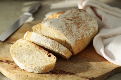 Photo of Freshly baked sourdough bread on light table