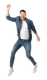 Photo of Full length portrait of happy handsome man jumping on white background