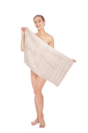 Full length portrait of young pretty woman with towel on white background