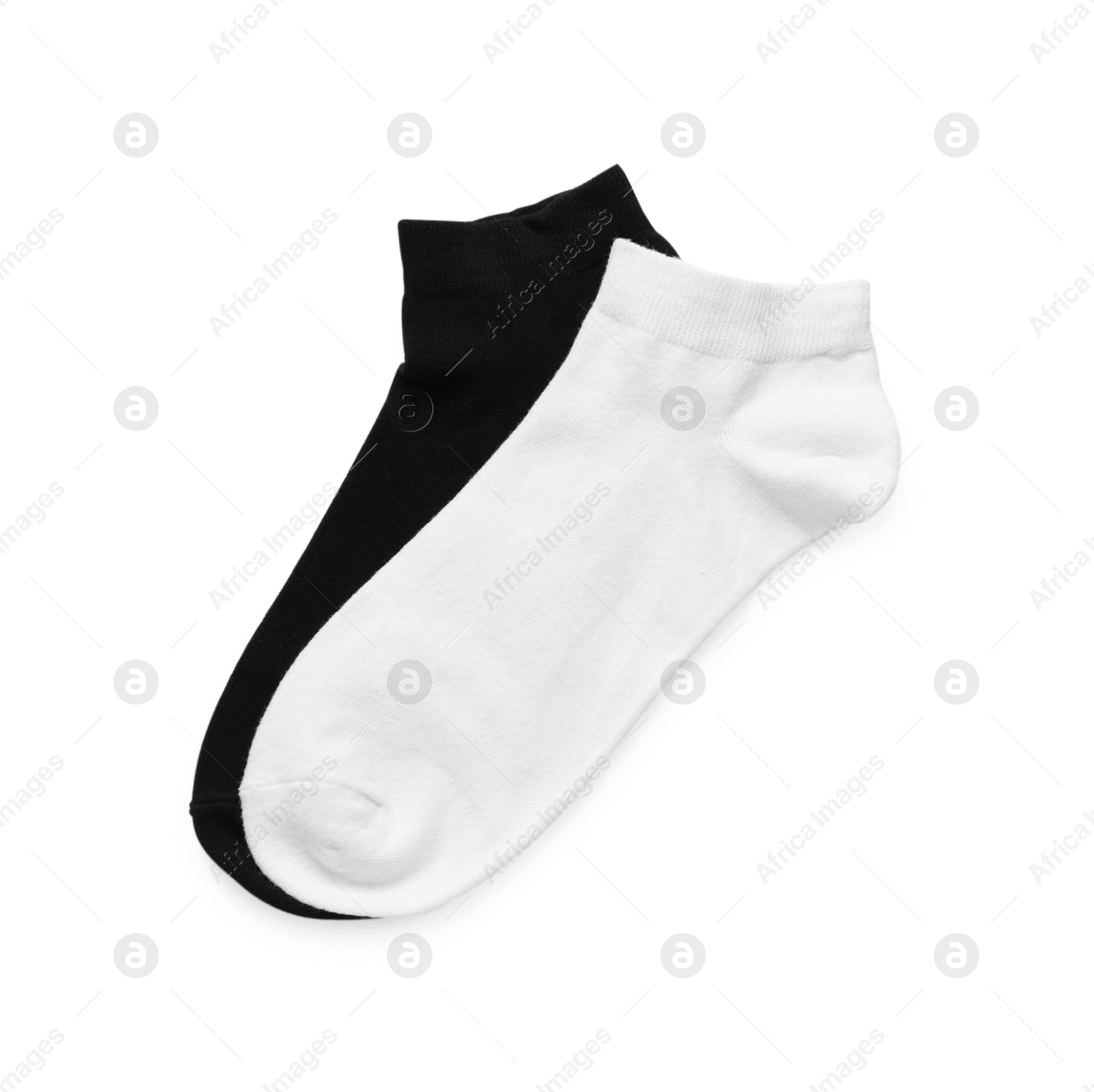 Photo of Different socks isolated on white, top view