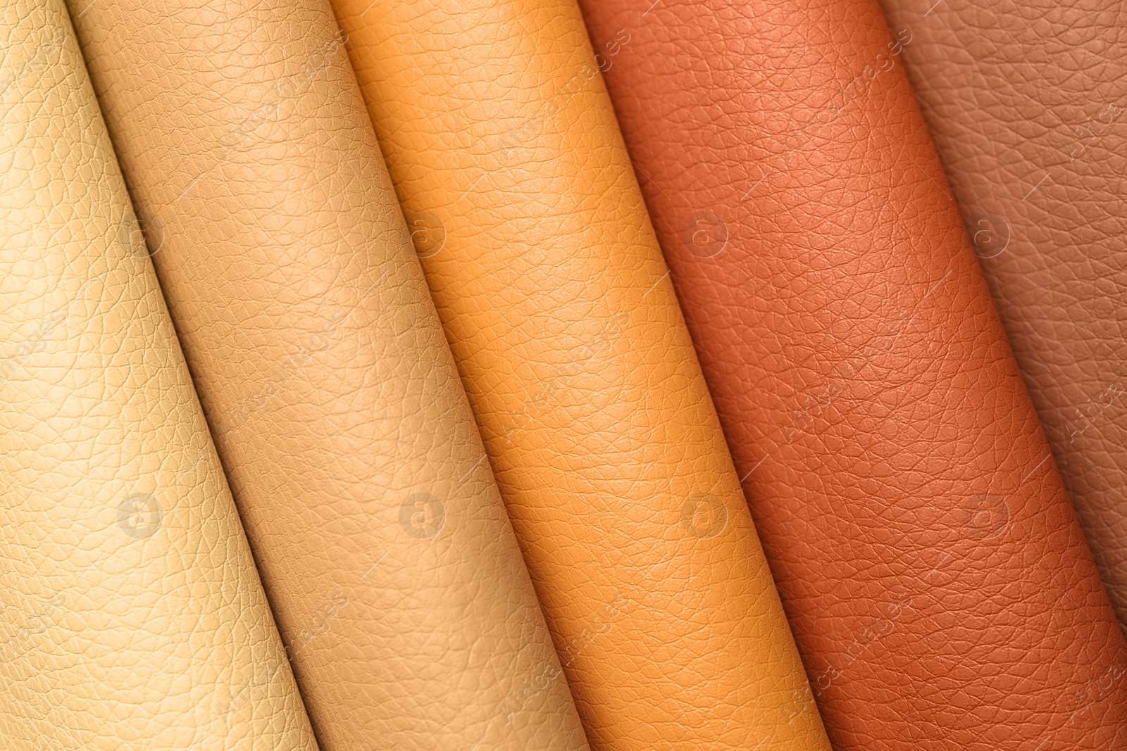 Photo of Leather samples of different colors for interior design as background