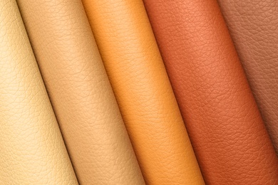 Leather samples of different colors for interior design as background