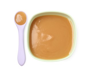 Tasty baby food in bowl and spoon isolated on white, top view