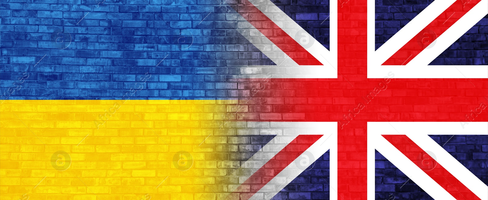 Image of Flags of United Kingdom and Ukraine on brick wall, banner design. International diplomatic relationships