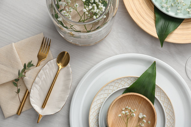 Elegant festive setting on white wooden table, flat lay