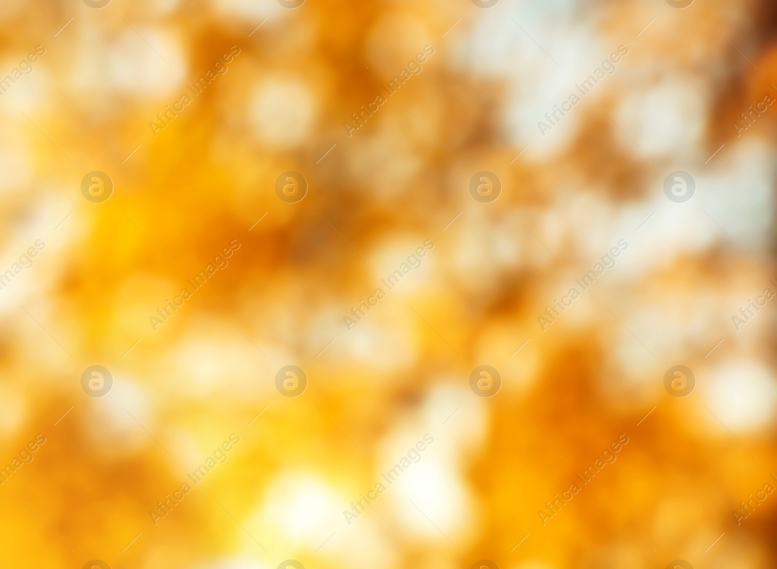 Image of Blurred view of abstract yellow background. Bokeh effect