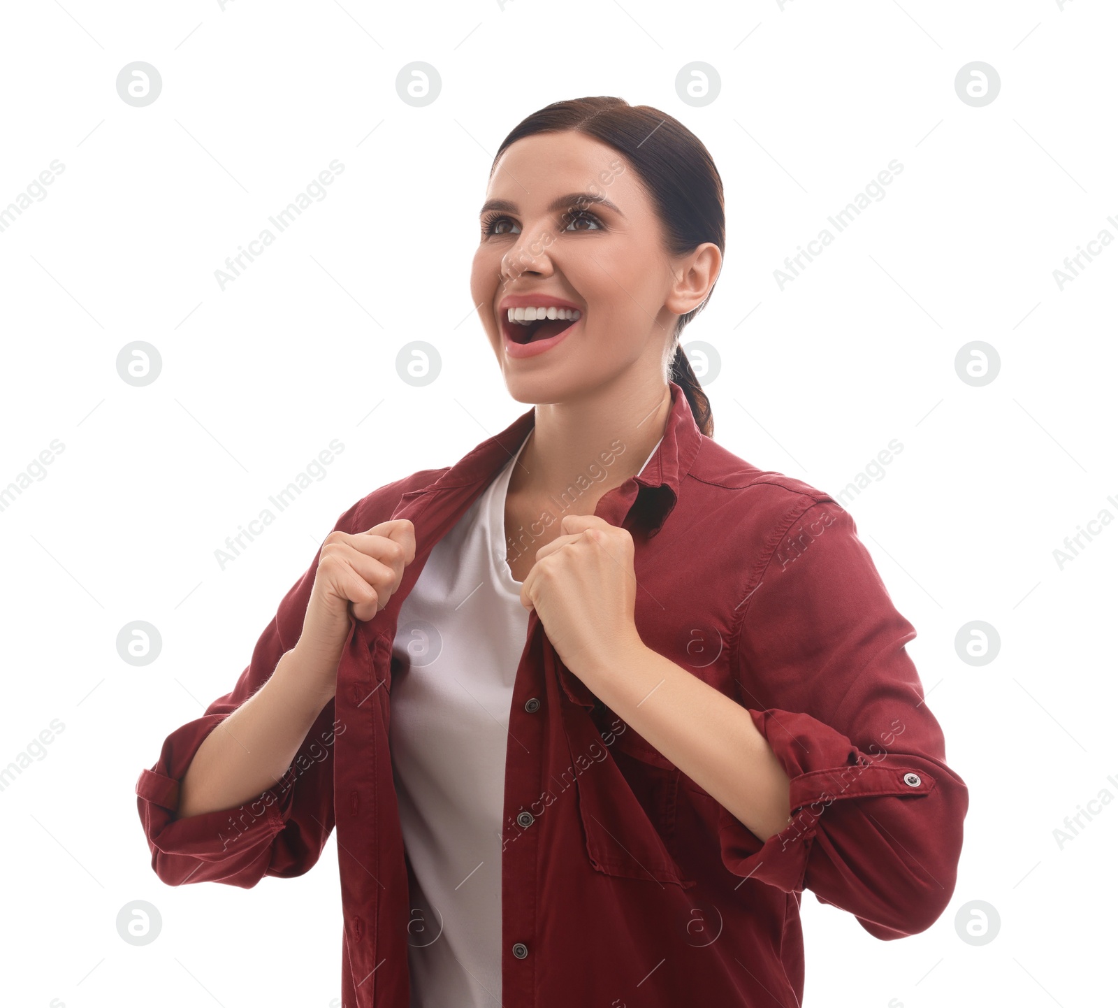 Photo of Emotional sports fan celebrating on white background