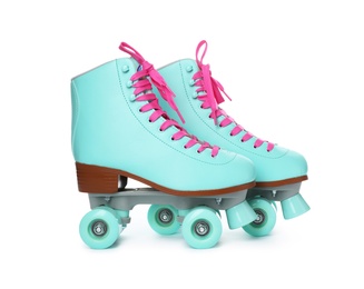 Photo of Pair of bright stylish roller skates on white background