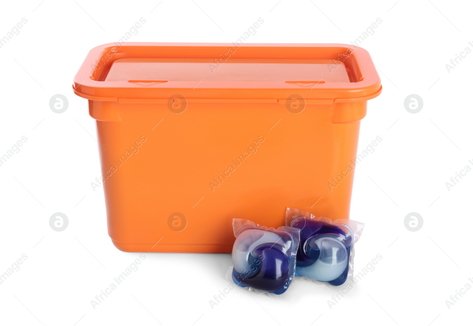 Photo of Laundry capsules and box on white background