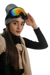 Woman wearing stylish winter sport clothes on white background