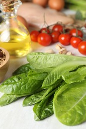 Photo of Many different healthy food on white table, closeup