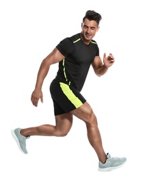 Photo of Sporty young man running on white background