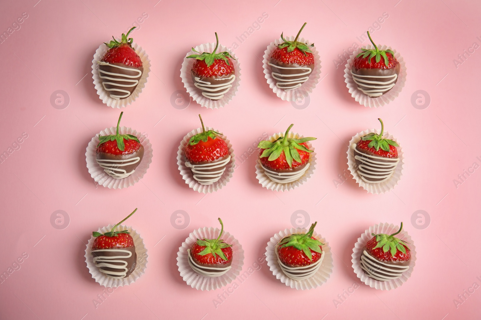 Photo of Flat lay composition with chocolate covered strawberries on color background