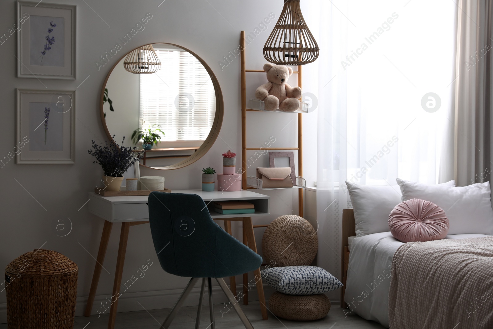 Photo of Teenage girl's bedroom interior with stylish furniture. Idea for design