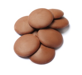 Photo of Delicious milk chocolate chips on white background