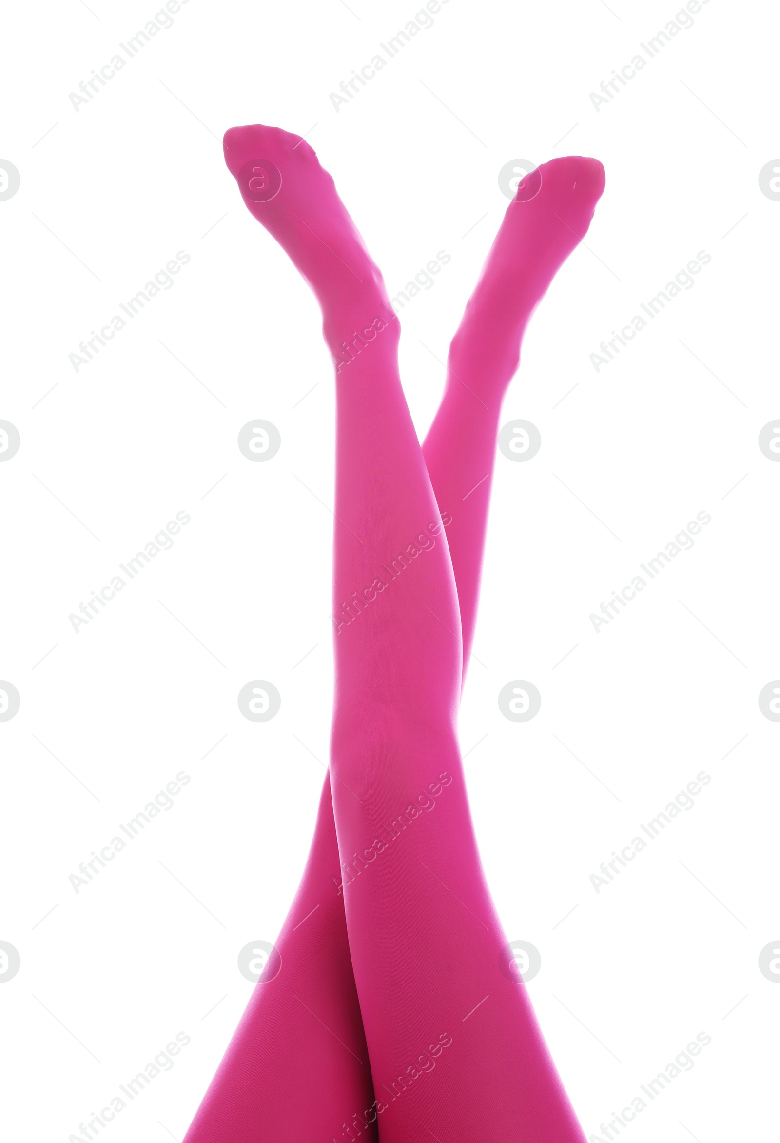 Photo of Woman wearing pink tights on white background, closeup of legs
