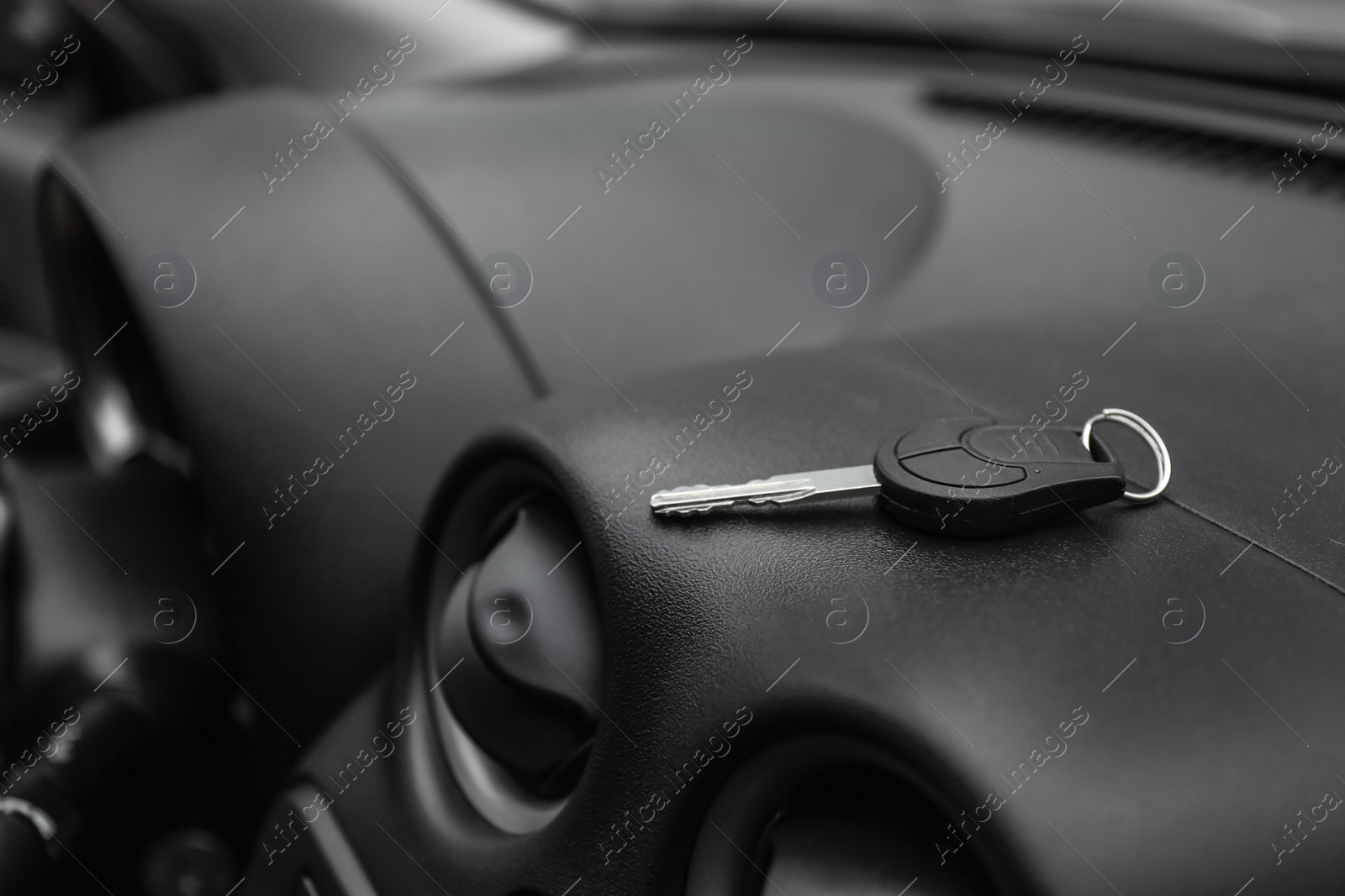 Photo of Key in new modern automobile. Car buying