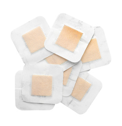 Photo of Medical sticking plasters isolated on white. First aid item