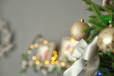 Photo of Christmas tree with stylish decor indoors, closeup