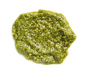 Photo of Sample of tasty pesto sauce isolated on white, top view