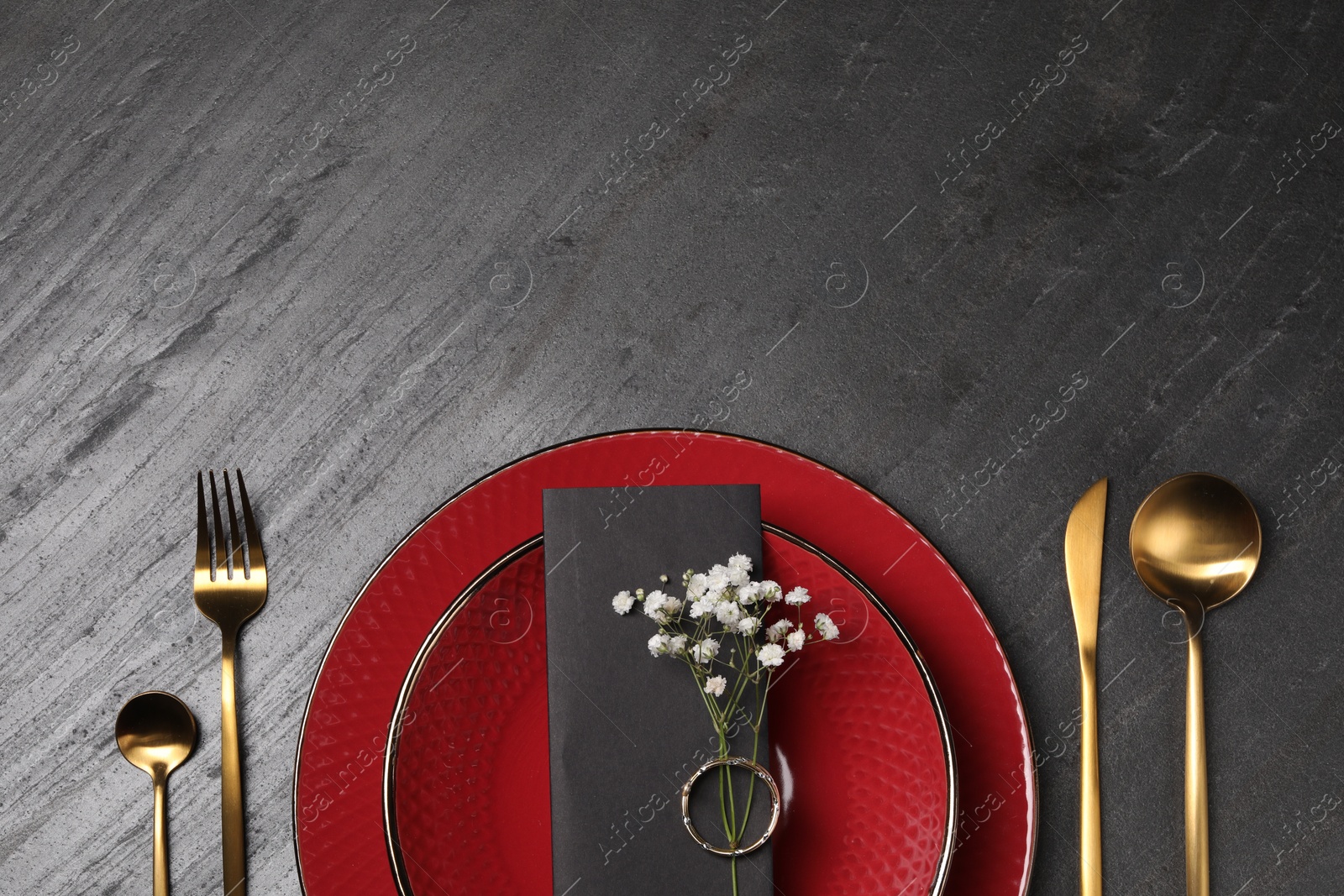 Photo of Elegant table setting with floral decor, flat lay. Space for text