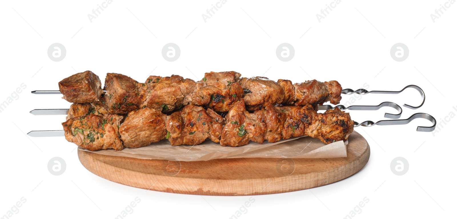 Photo of Metal skewers with delicious meat on white background