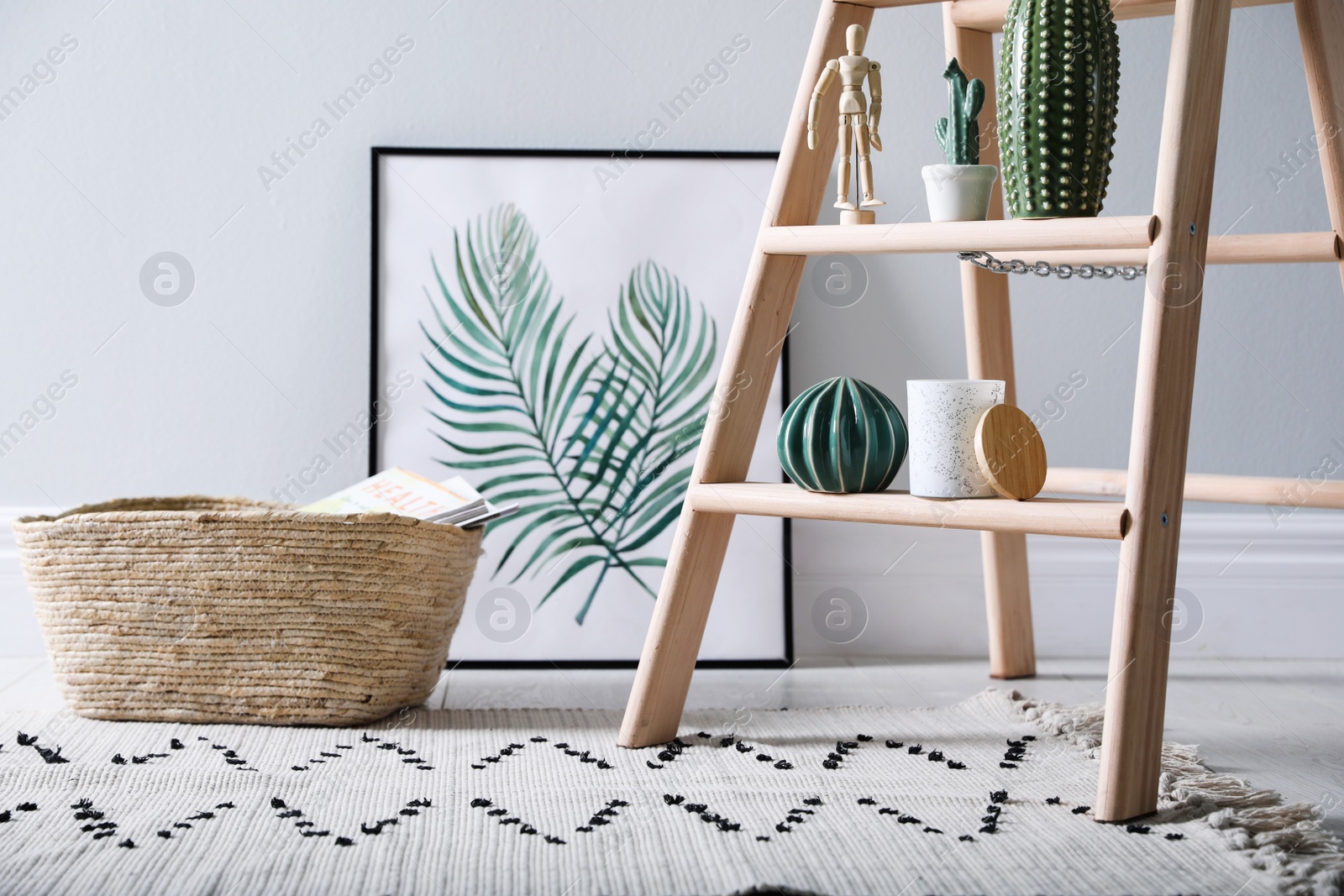 Photo of Stylish wooden ladder in modern room interior, closeup