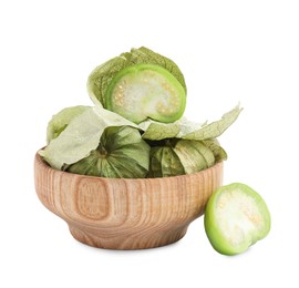 Photo of Fresh green tomatillos with husk in bowl isolated on white