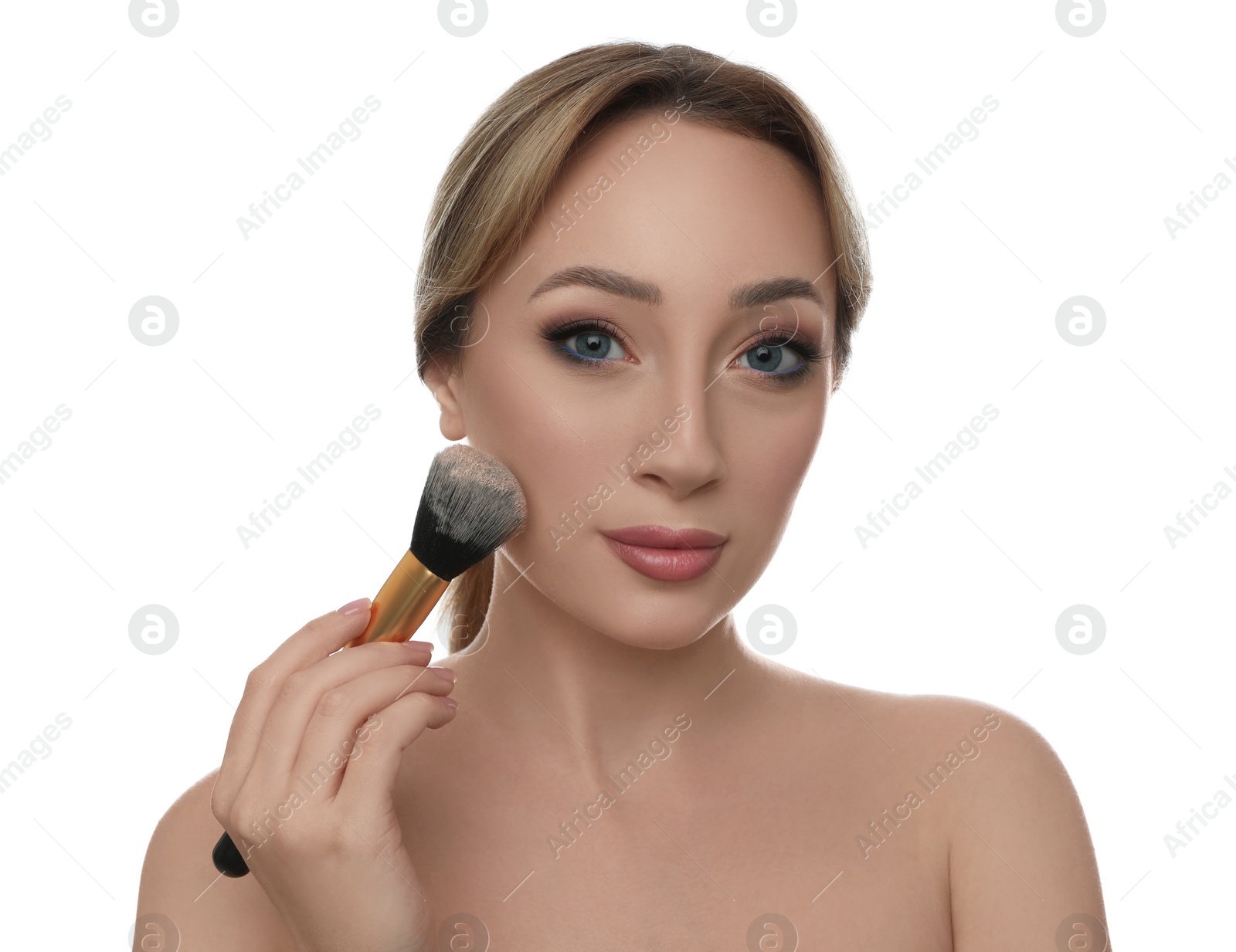 Photo of Beautiful young woman applying face powder with brush on white background