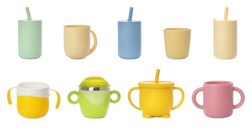 Image of Set with colorful baby cups on white background. Banner design