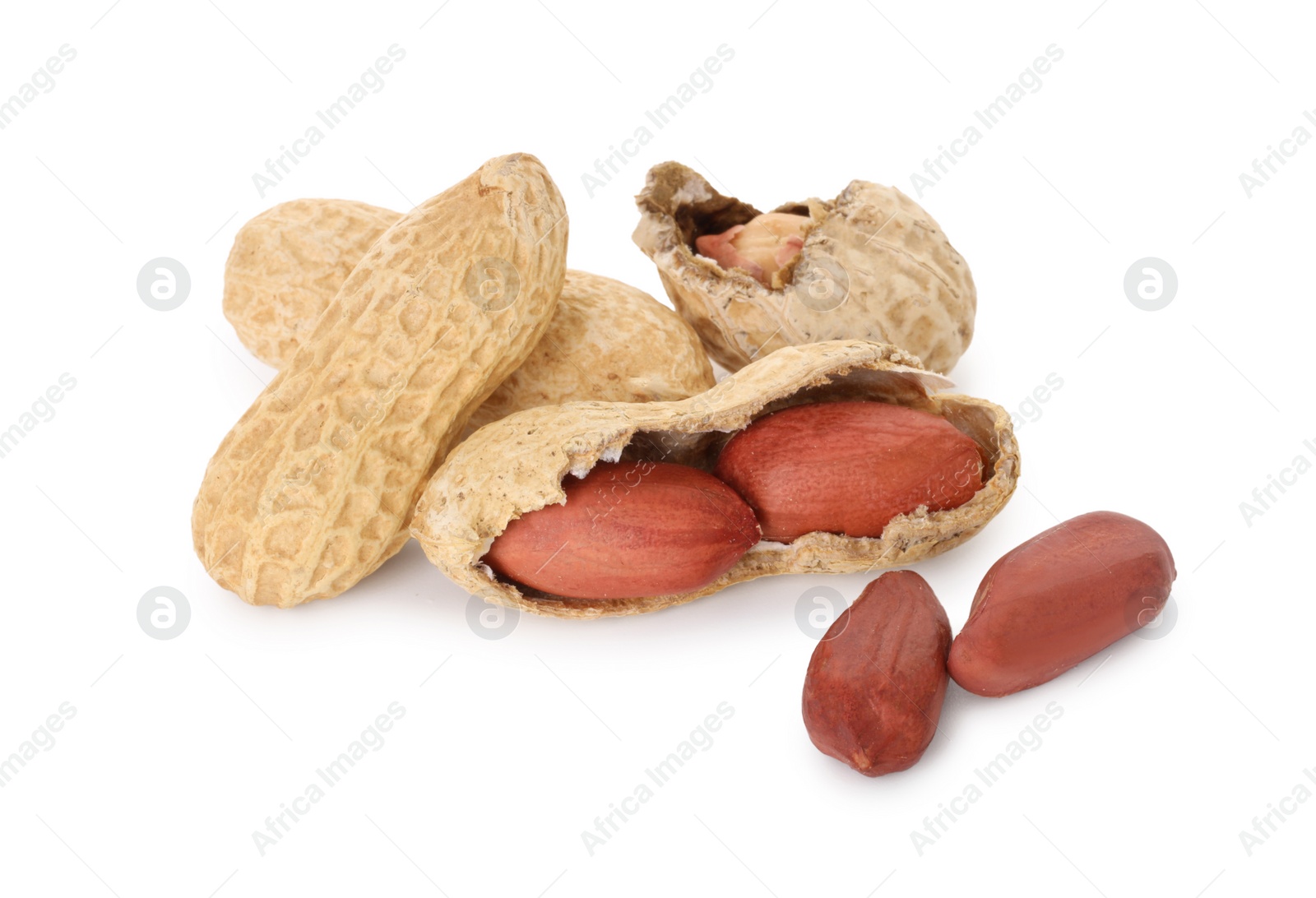 Photo of Fresh unpeeled peanuts isolated on white. Healthy snack