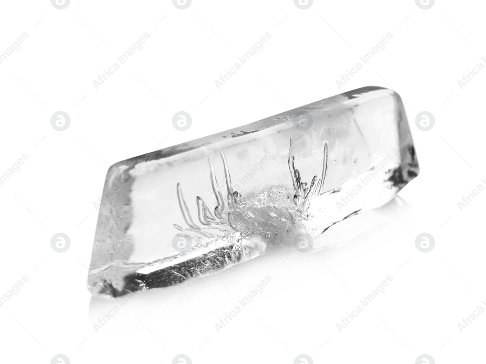 Photo of Piece of ice melting on white background