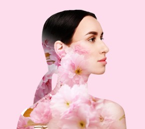 Image of Double exposure of beautiful woman and blooming flowers on light pink background
