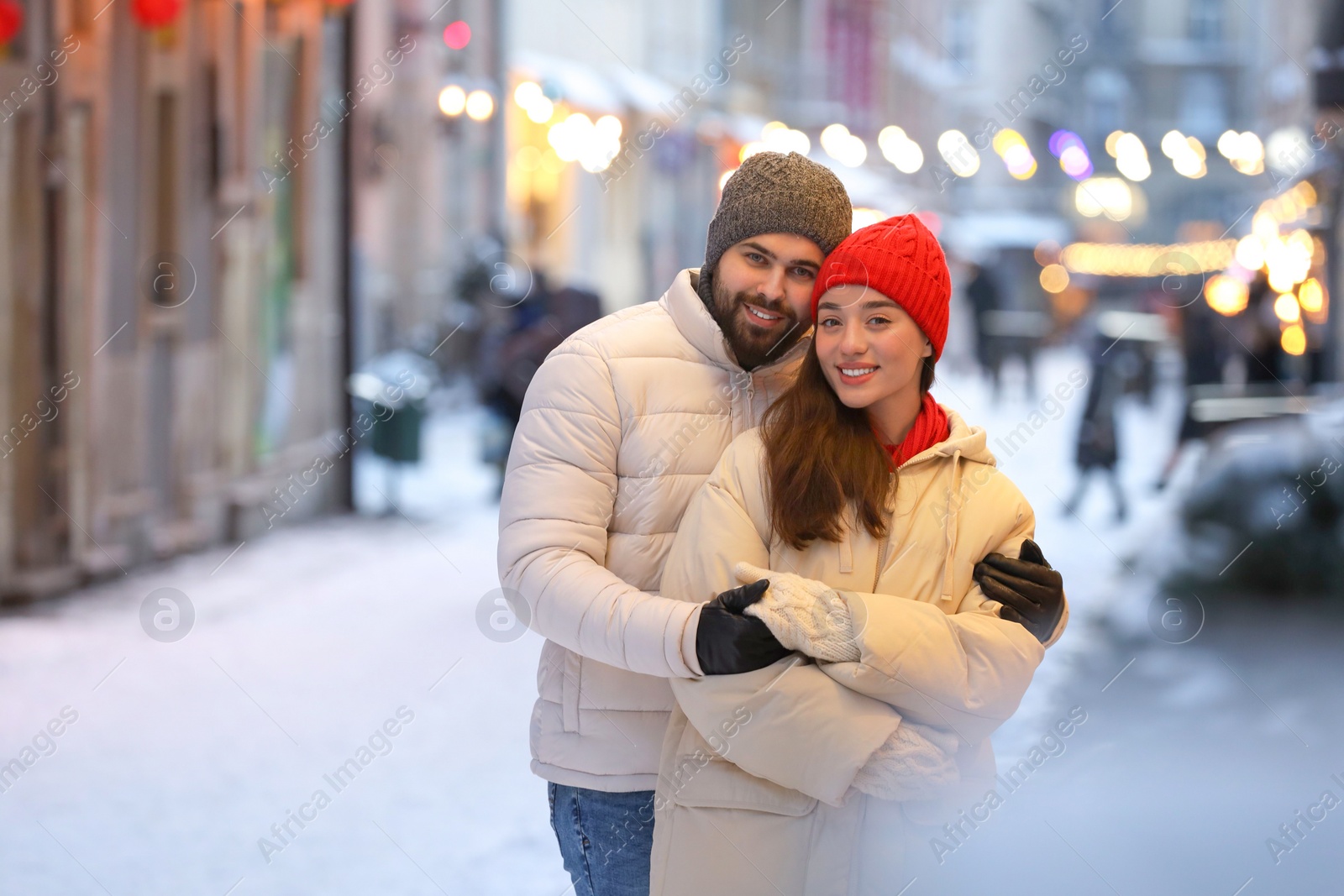 Photo of Lovely couple spending time together on city street