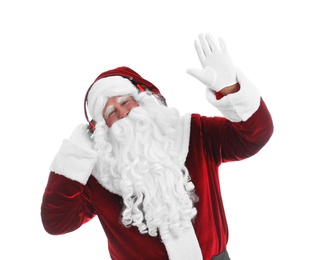 Photo of Santa Claus with headphones listening to Christmas music on white background