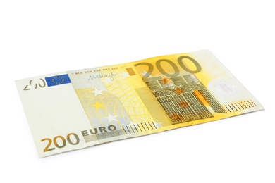Photo of Two hundred Euro banknote lying on white background