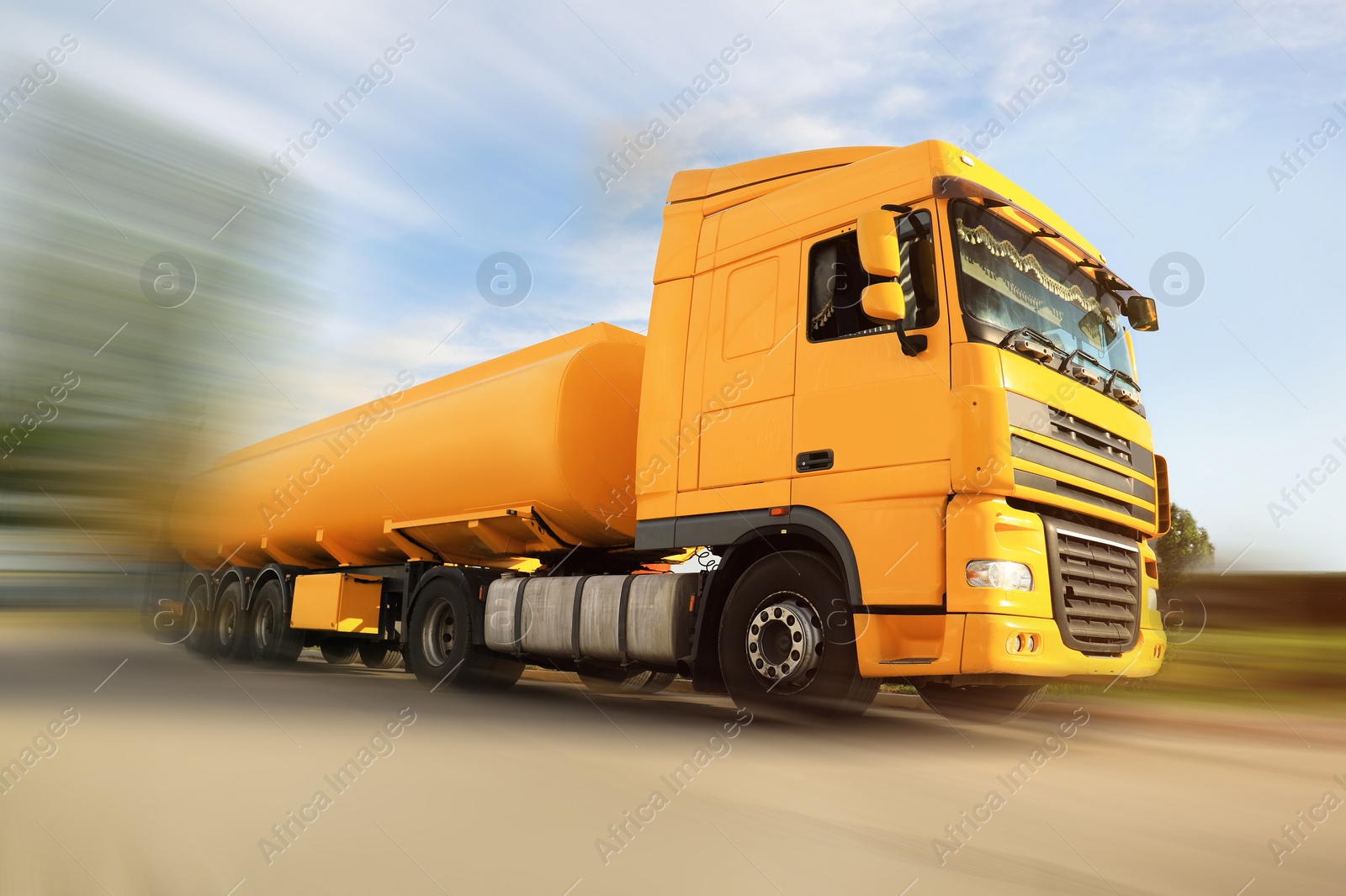 Image of Logistics concept. Truck on country road, motion blur effect 