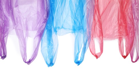 Many different plastic bags on white background