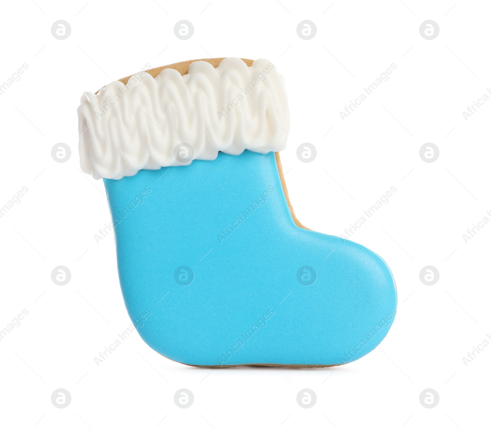 Photo of Tasty gingerbread cookie in shape of boot on white background. St. Nicholas Day celebration