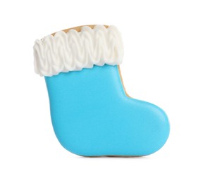 Photo of Tasty gingerbread cookie in shape of boot on white background. St. Nicholas Day celebration