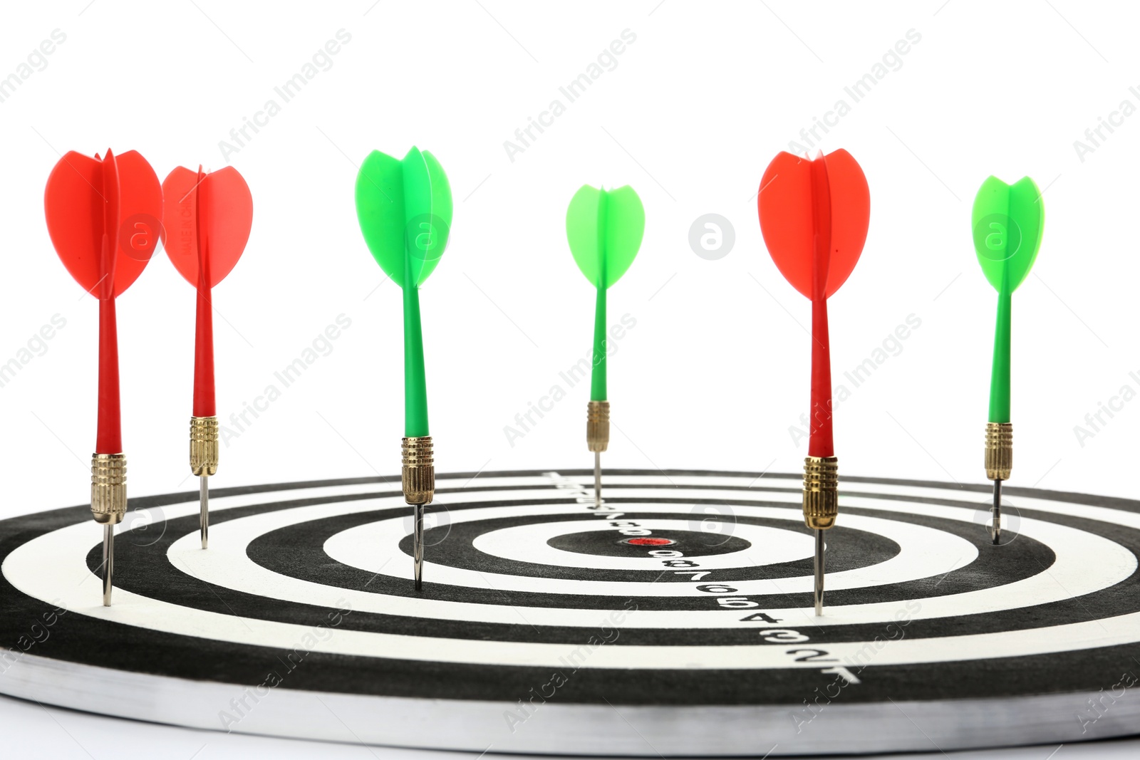 Photo of Arrows hitting target on dart board against white background