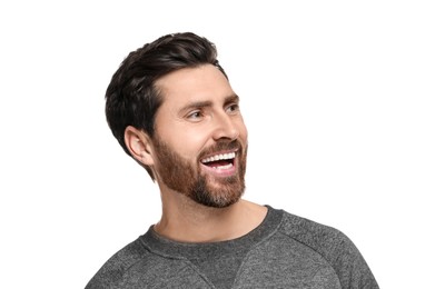 Smiling man with healthy clean teeth on white background