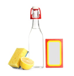 Photo of Composition with vinegar, lemon and baking soda on white background. House cleaning