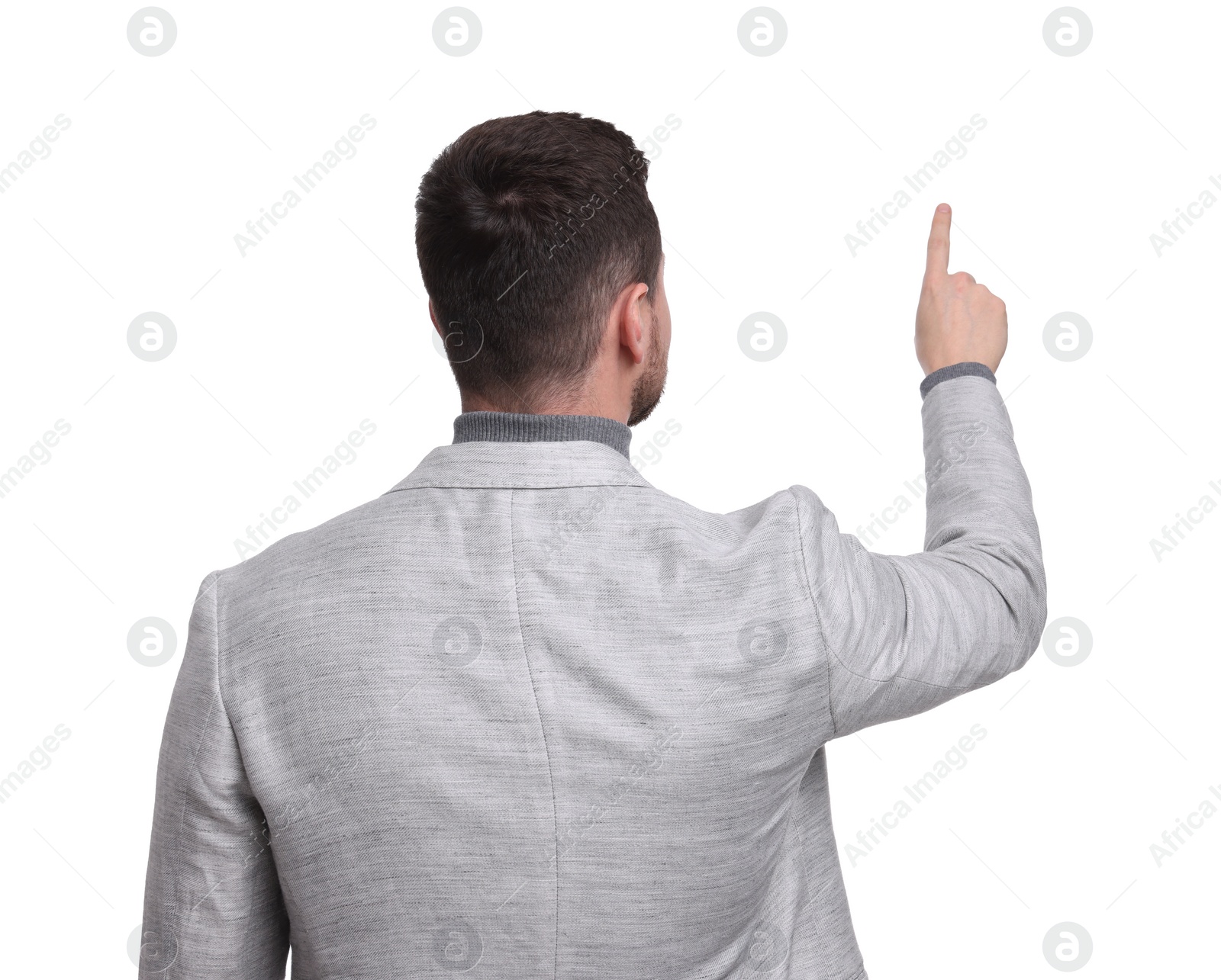 Photo of Businessman in suit pointing something on white background, back view